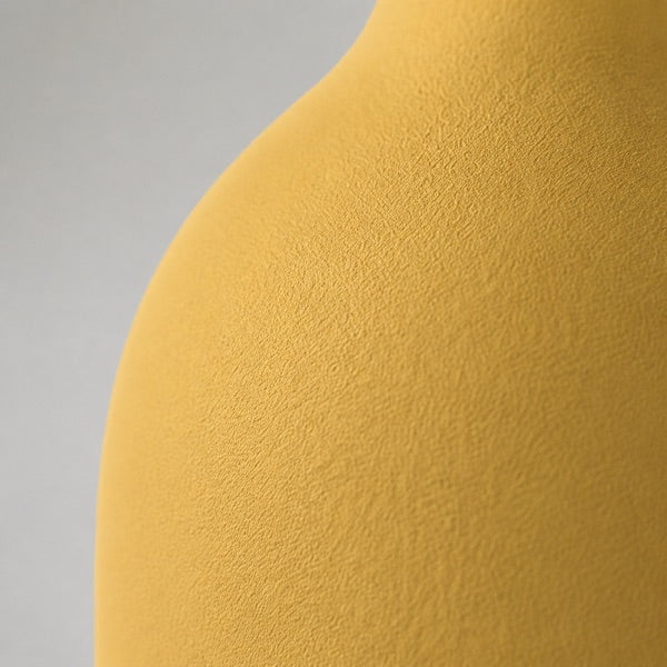 Mustard ceramic finish, close-up texture